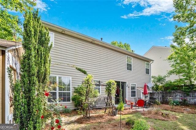 238 Diamond Valley Pass, Canton, GA 30114 - back of house with fence and a patio area