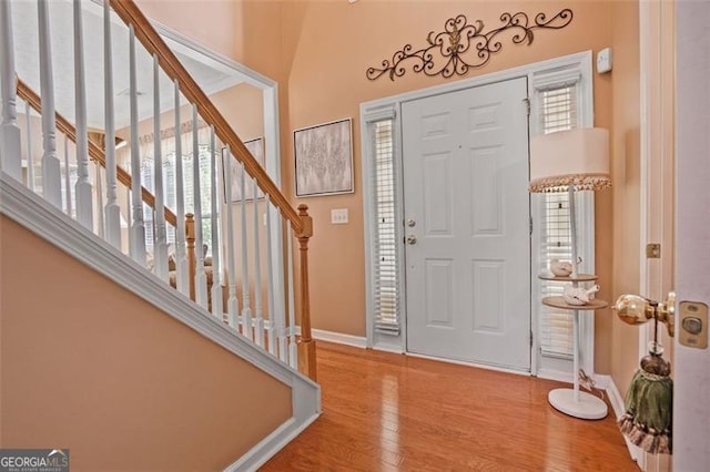 238 Diamond Valley Pass, Canton, GA 30114 - foyer with stairway, baseboards, and wood finished floors
