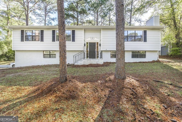 bi-level home with a chimney