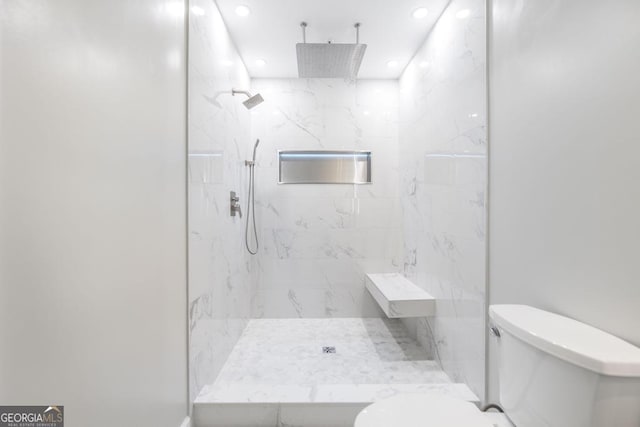 full bath with recessed lighting, a marble finish shower, and toilet