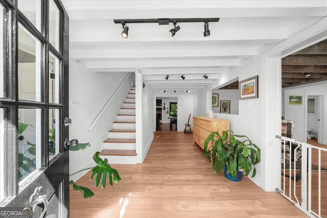 45 Michelle Cir NE, Atlanta, GA 30342 - corridor featuring track lighting, light wood-type flooring, and stairs