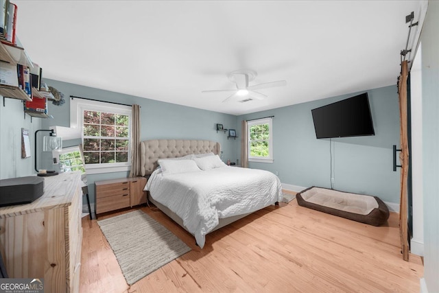 45 Michelle Cir NE, Atlanta, GA 30342 - bedroom featuring light wood-style flooring, ceiling fan, and baseboards