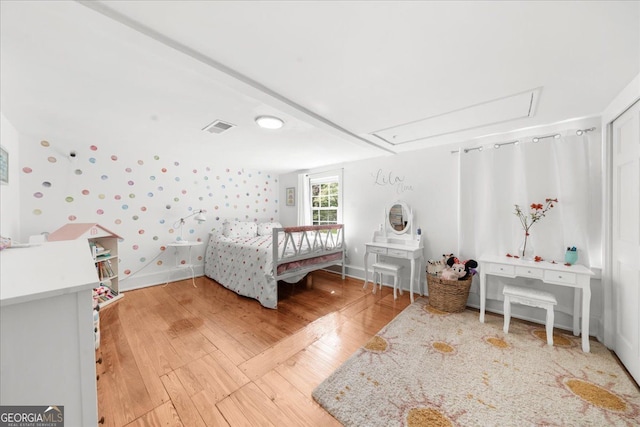 45 Michelle Cir NE, Atlanta, GA 30342 - bedroom with attic access and hardwood / wood-style floors