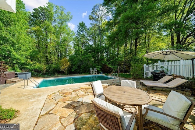 45 Michelle Cir NE, Atlanta, GA 30342 - view of swimming pool featuring a patio and grilling area