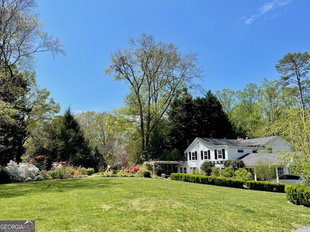 45 Michelle Cir NE, Atlanta, GA 30342 - view of green lawn with a pergola
