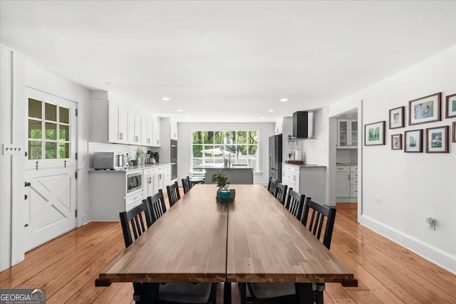 45 Michelle Cir NE, Atlanta, GA 30342 - dining room with light wood-style floors, baseboards, and recessed lighting