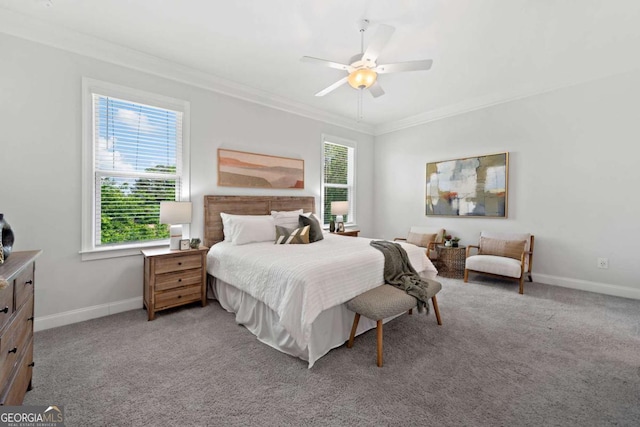 bedroom with crown molding, baseboards, ceiling fan, and light colored carpet