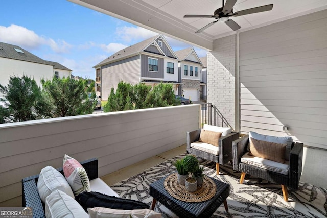 balcony with ceiling fan, outdoor lounge area, and a residential view