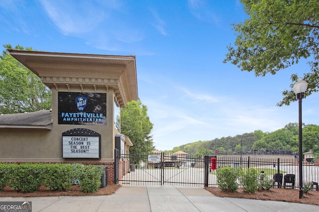 exterior space with a gate and fence
