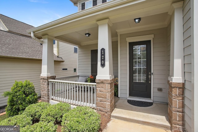 entrance to property with covered porch