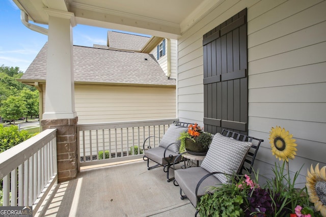 balcony featuring covered porch