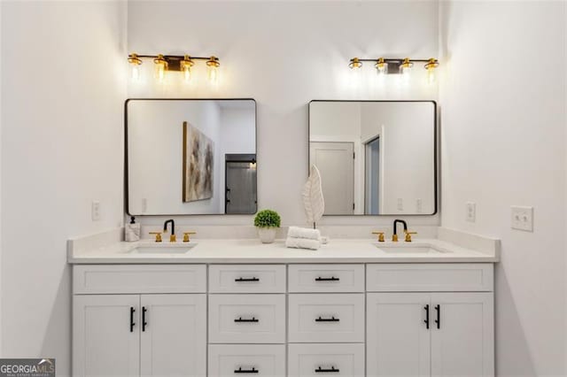 bathroom with double vanity and a sink