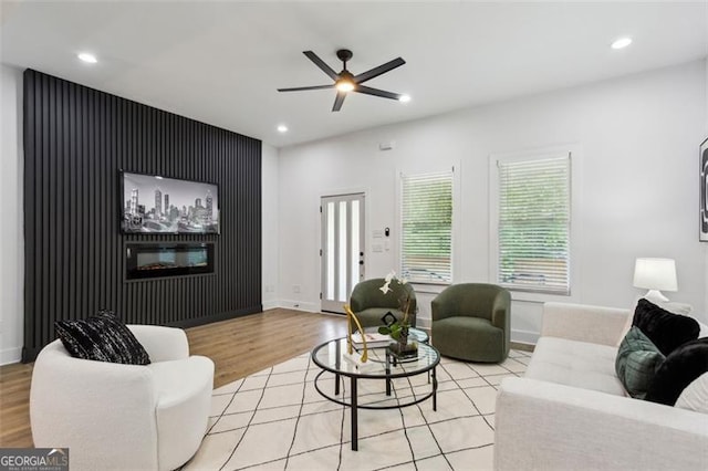 living room with recessed lighting, ceiling fan, and wood finished floors