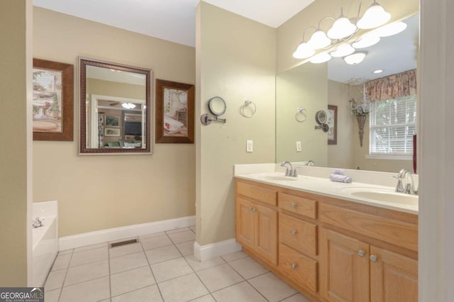 full bath featuring a sink, tile patterned floors, double vanity, and visible vents