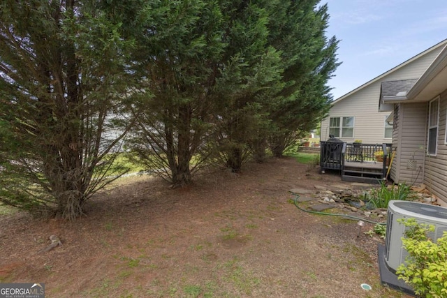 view of yard featuring a deck