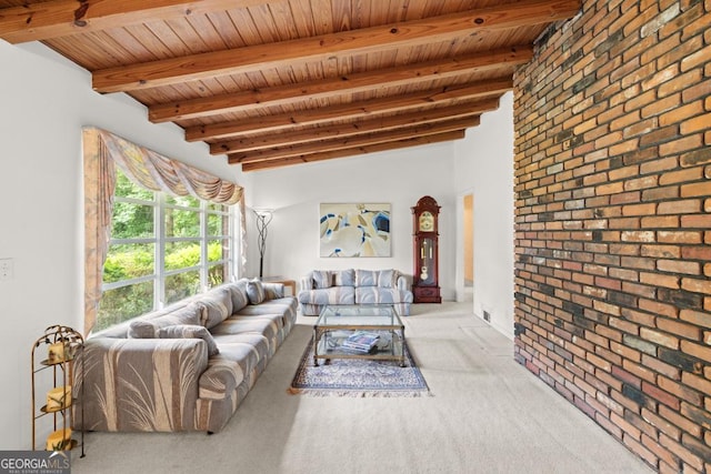 carpeted living area featuring wood ceiling, beamed ceiling, and brick wall