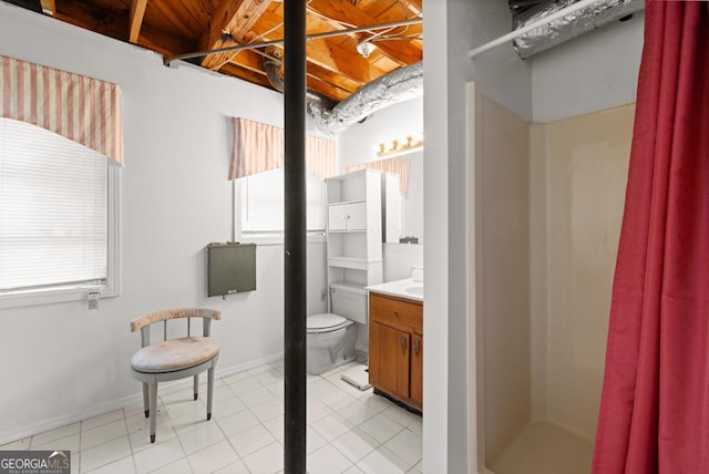 full bathroom with tile patterned floors, vanity, toilet, and a shower
