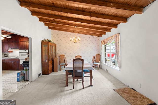 dining room with visible vents, wooden ceiling, a notable chandelier, vaulted ceiling with beams, and wallpapered walls