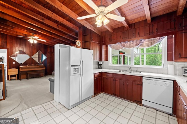 kitchen featuring white appliances, a ceiling fan, wooden ceiling, and a sink