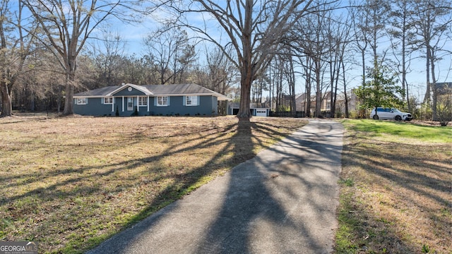 view of road with driveway