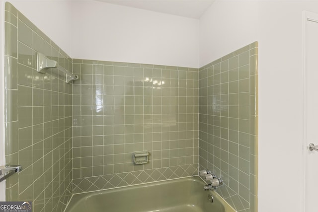bathroom featuring  shower combination