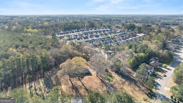 bird's eye view with a view of trees and a residential view