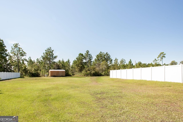 view of yard featuring fence