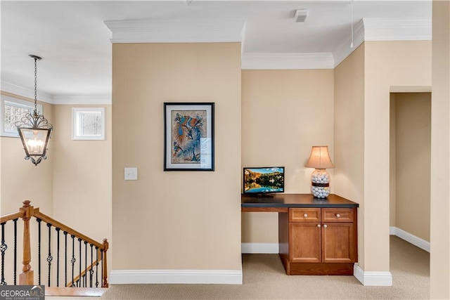 corridor with crown molding, light carpet, and an upstairs landing