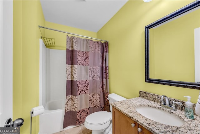 bathroom featuring toilet, shower / bath combo, and vanity