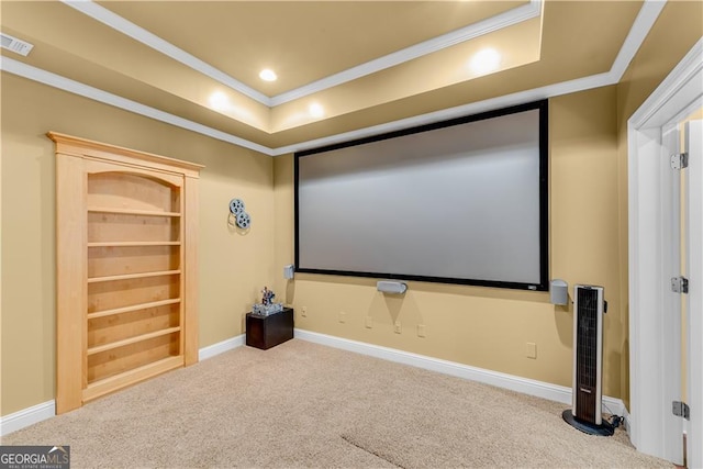 carpeted cinema with visible vents, recessed lighting, baseboards, and crown molding