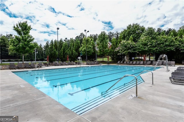 pool with a patio area