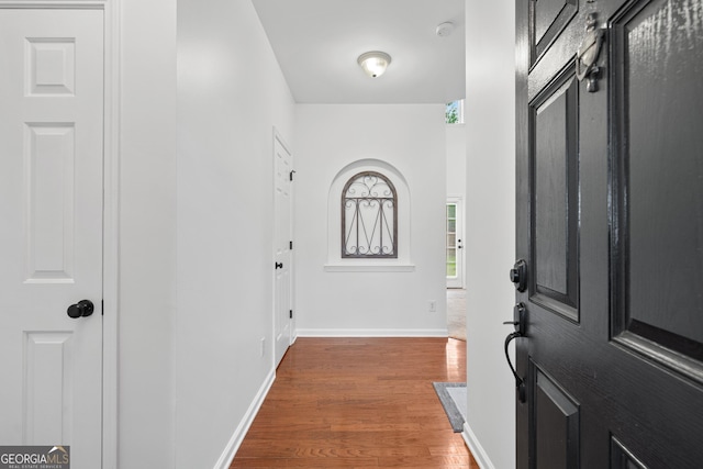 449 Highlands Loop, Woodstock, GA 30188 - foyer featuring wood finished floors and baseboards