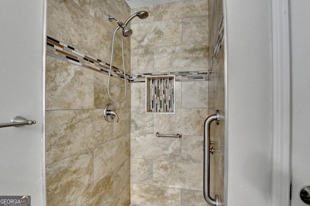 full bathroom featuring a shower stall