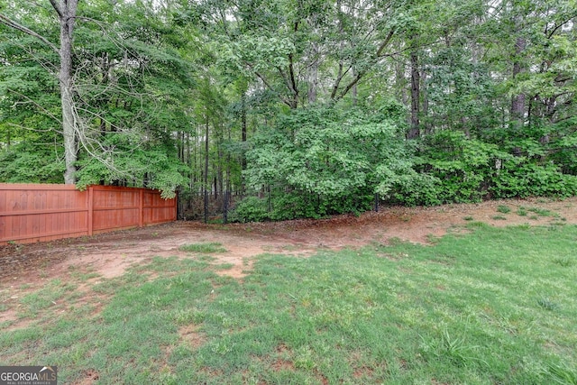 view of yard featuring fence