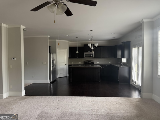 1124 Pebble Creek Ln, Locust Grove, GA 30248 - kitchen featuring a sink, stainless steel appliances, dark colored carpet, and a center island