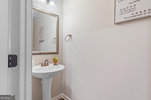 bathroom featuring baseboards