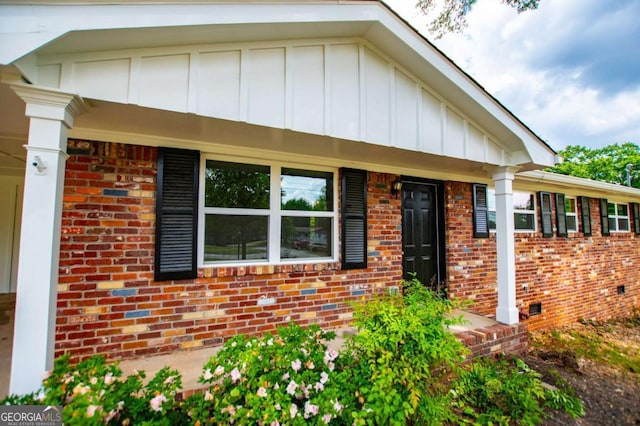 6213 Cherry Ln, Douglasville, GA 30134 - view of front of property featuring board and batten siding, brick siding, and crawl space