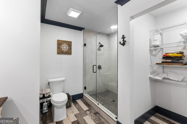 1601 Arrowhead Rd, Greensboro, GA 30642 - bathroom featuring toilet and a shower stall