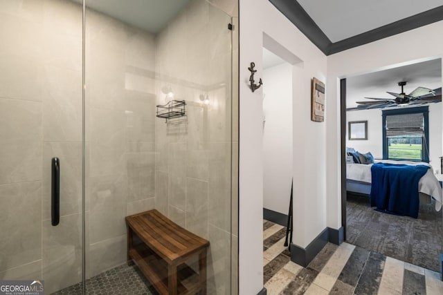 1601 Arrowhead Rd, Greensboro, GA 30642 - bathroom featuring connected bathroom, ceiling fan, and a stall shower
