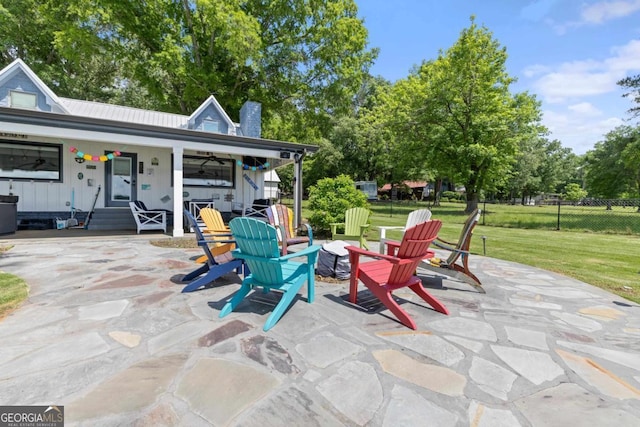 1601 Arrowhead Rd, Greensboro, GA 30642 - view of patio / terrace featuring a fire pit and fence
