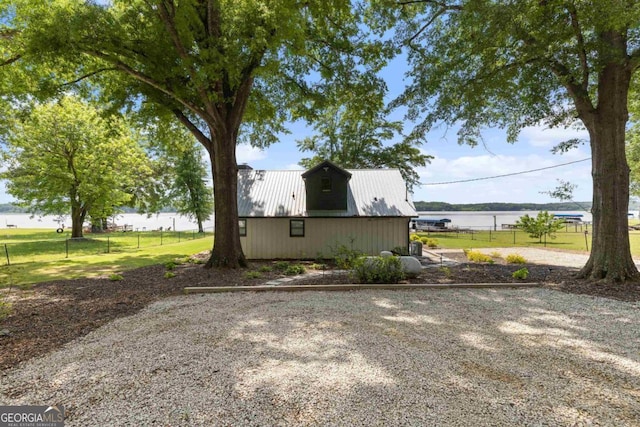 1601 Arrowhead Rd, Greensboro, GA 30642 - view of property exterior featuring fence and a water view