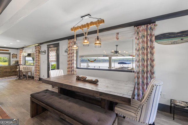 1601 Arrowhead Rd, Greensboro, GA 30642 - dining area with a ceiling fan and wood finished floors