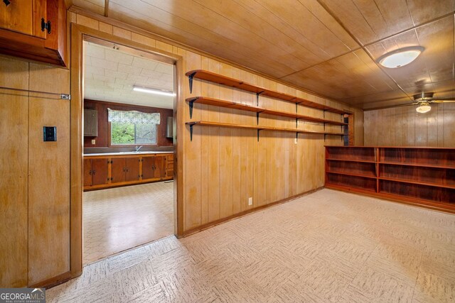 3011 Refuge Rd, Jasper, GA 30143 - interior space featuring a ceiling fan, light floors, wood ceiling, a sink, and wooden walls