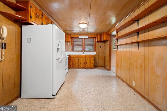 3011 Refuge Rd, Jasper, GA 30143 - kitchen featuring wood ceiling, open shelves, brown cabinetry, white appliances, and wooden walls