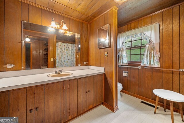 3011 Refuge Rd, Jasper, GA 30143 - bathroom featuring toilet, ornamental molding, wood ceiling, wood walls, and vanity
