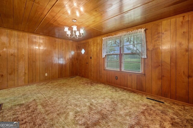 3011 Refuge Rd, Jasper, GA 30143 - unfurnished room featuring an inviting chandelier, wooden walls, wood ceiling, and visible vents