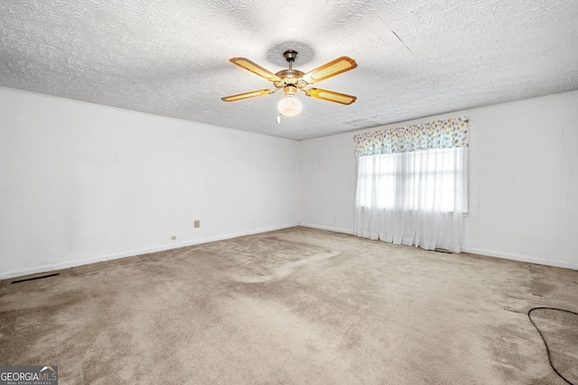 3011 Refuge Rd, Jasper, GA 30143 - carpeted spare room with a ceiling fan and a textured ceiling