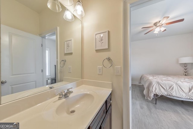 197 Hickory Pointe Dr, Acworth, GA 30101 - bathroom featuring vanity, wood finished floors, and a ceiling fan