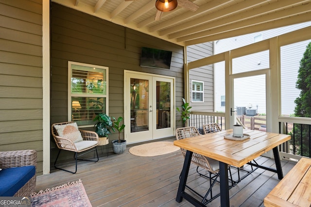 wooden deck featuring french doors