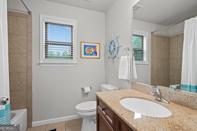 bathroom featuring toilet, baseboards, visible vents, tile patterned flooring, and vanity